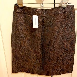 Lady’s short skirt with sparkling thread by Banaba Republic. Fits size 4. New.
